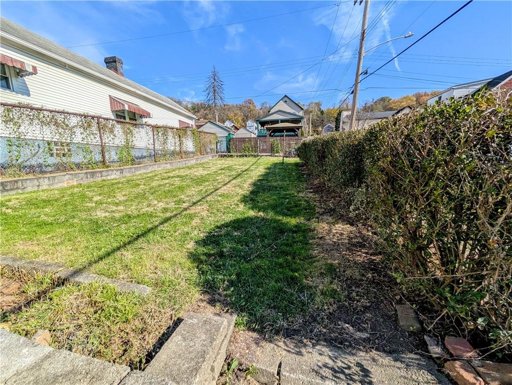 643 Indiana Avenue Glassport, PA 15045 - Photo 31 of 32 a view of a backyard of the house
