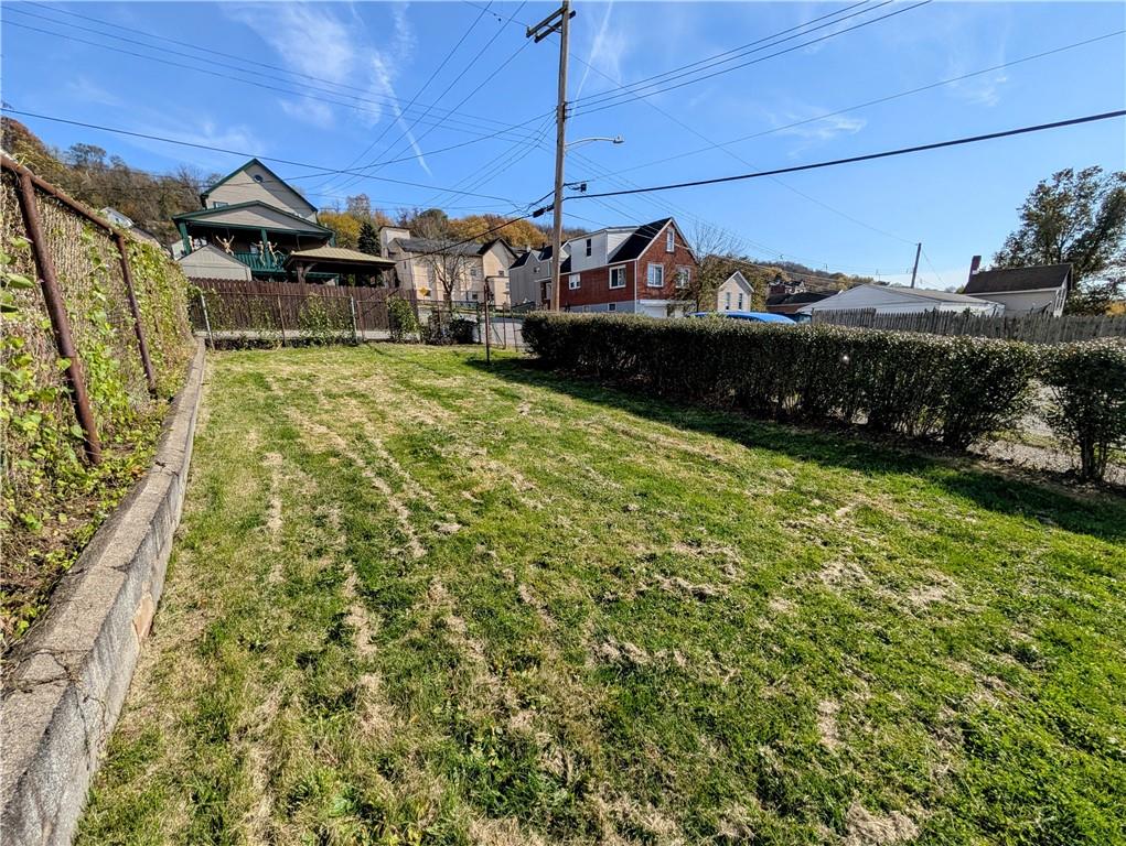 643 Indiana Avenue Glassport, PA 15045 - Photo 32 of 32 a view of a house with a yard and potted plants