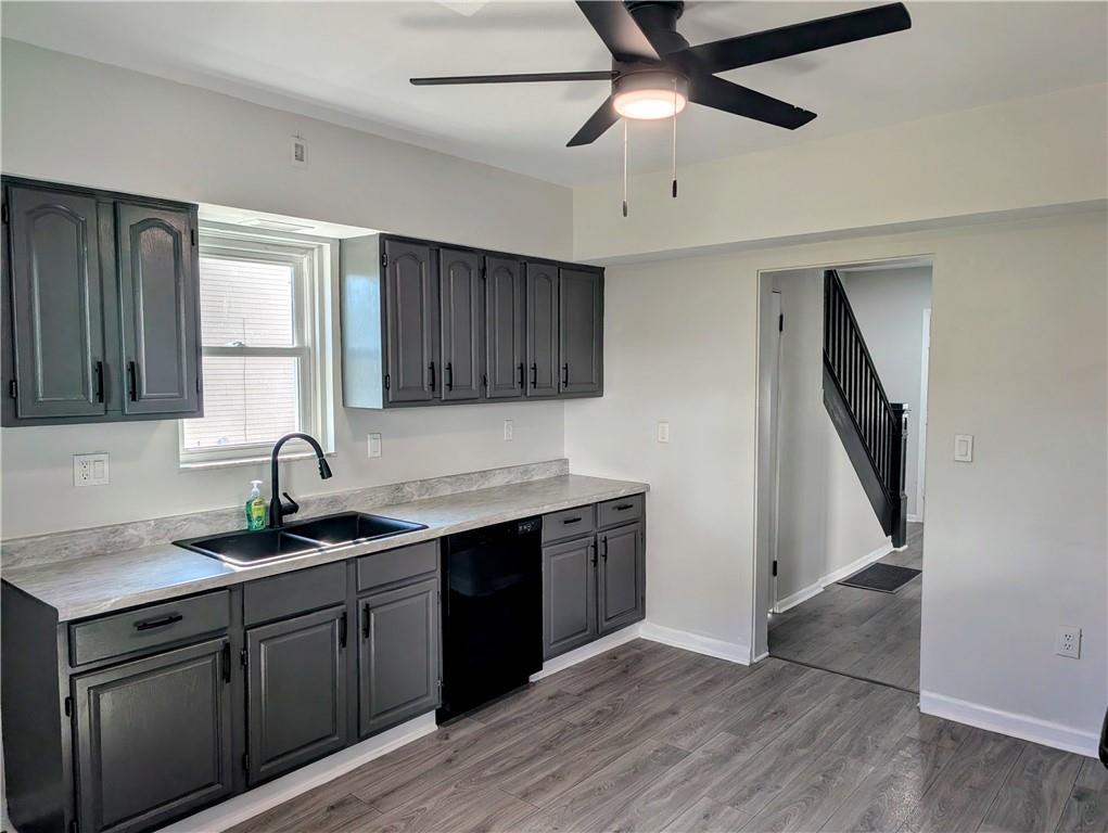 643 Indiana Avenue Glassport, PA 15045 - Photo 5 of 32 a kitchen with a sink appliances and cabinets