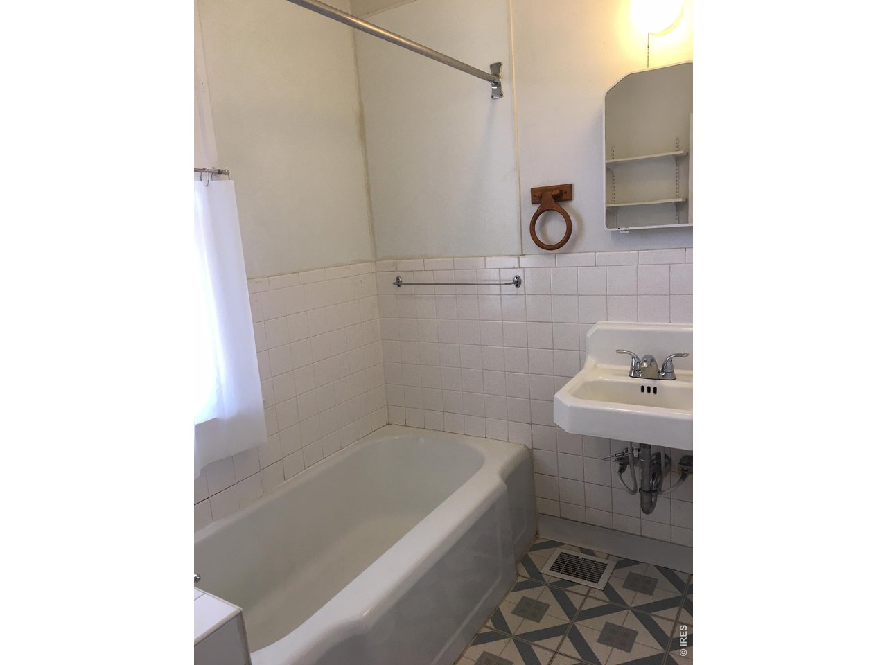 612 South Howes Street Fort Collins, CO 80521 - Photo 15 of 18 a bathroom with a bathtub and shower