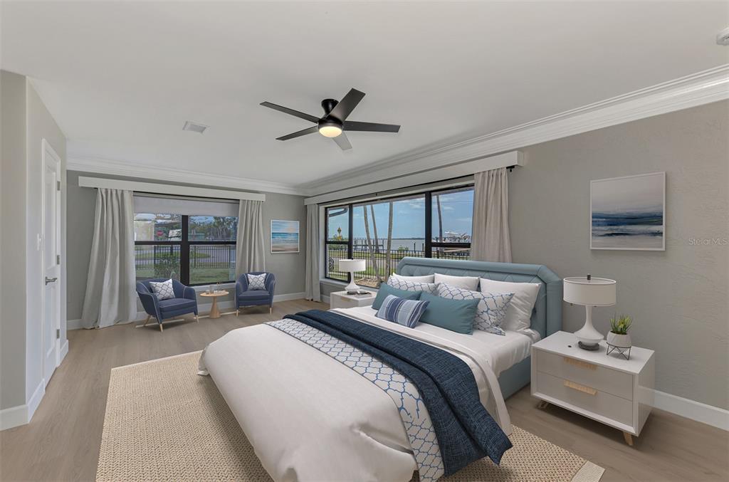 1822 Riverside Drive East Bradenton, FL 34208 - Photo 16 of 46 a bedroom with bed and large window
