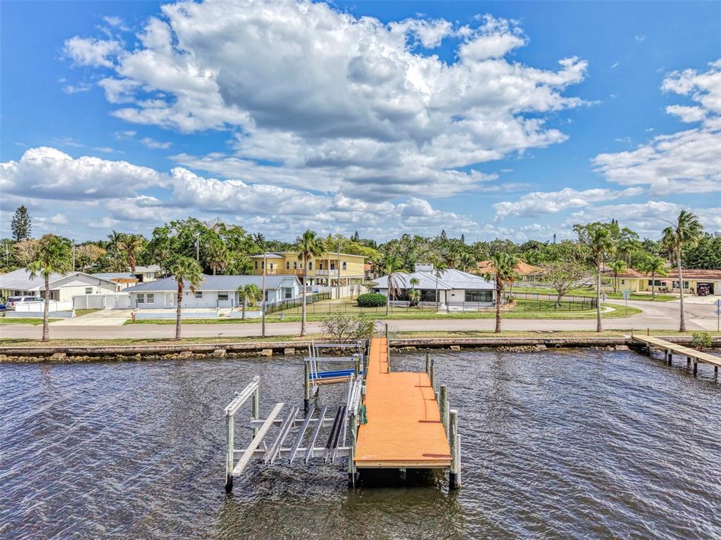 1822 Riverside Drive East Bradenton, FL 34208 - Photo 40 of 46 a view of a swimming pool and an outdoor seating