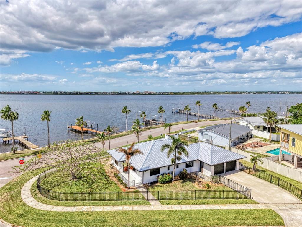 1822 Riverside Drive East Bradenton, FL 34208 - Photo 4 of 46 a view of a swimming pool with outdoor seating