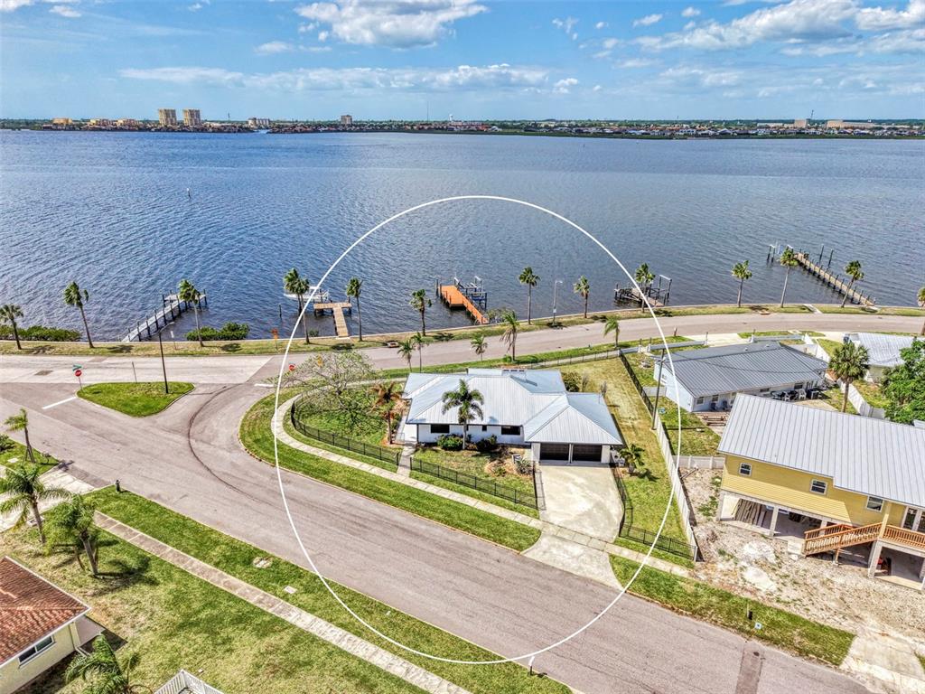 1822 Riverside Drive East Bradenton, FL 34208 - Photo 5 of 46 a view of swimming pool with outdoor seating and yard