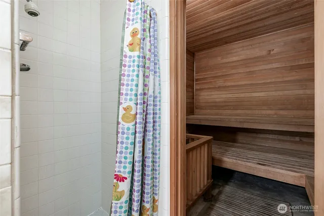 a living room with furniture a couch and dresser