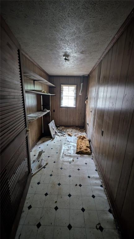 3855 Mercer Street Macon, GA 31204 - Photo 11 of 14 a bathroom with a sink and a large mirror