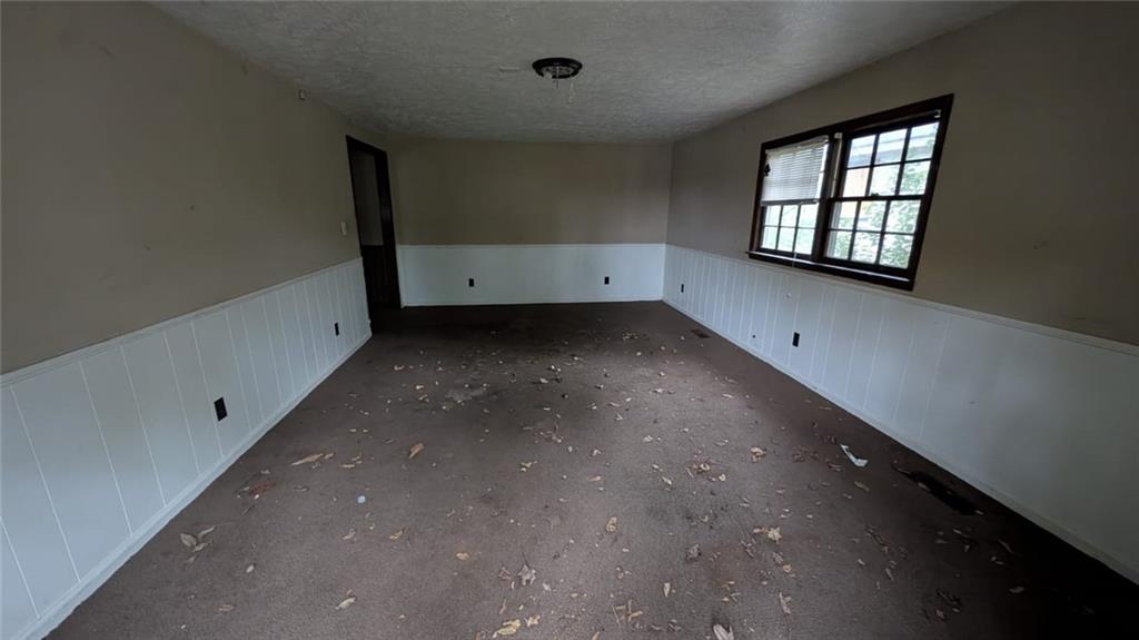 3855 Mercer Street Macon, GA 31204 - Photo 5 of 14 an empty room with a window