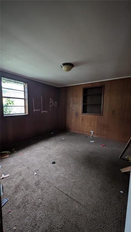 3855 Mercer Street Macon, GA 31204 - Photo 6 of 14 an empty room with a empty space and windows