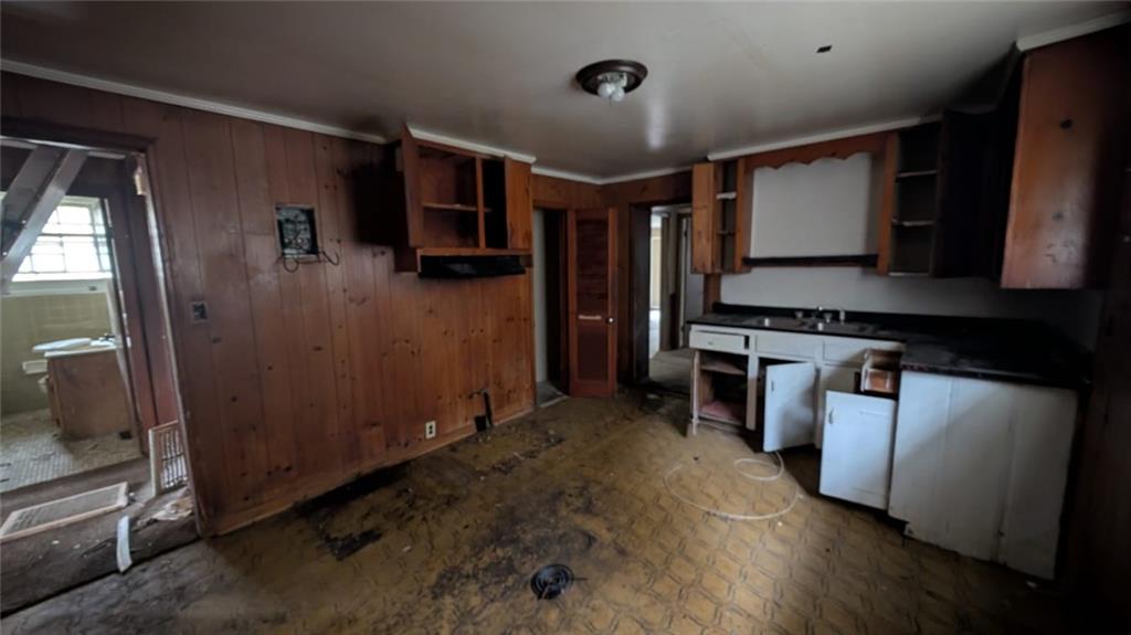 3855 Mercer Street Macon, GA 31204 - Photo 10 of 14 a kitchen with stainless steel appliances granite countertop a refrigerator and a stove