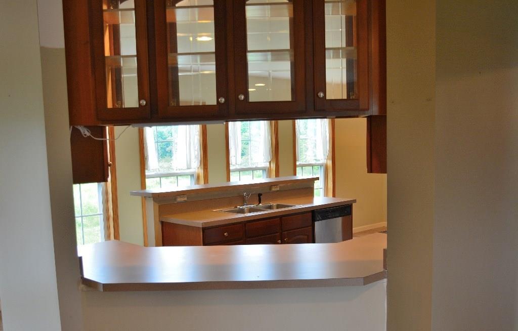 219 Range Road Cumberland, ME 04021 - Photo 9 of 21 Open living area to kitchen