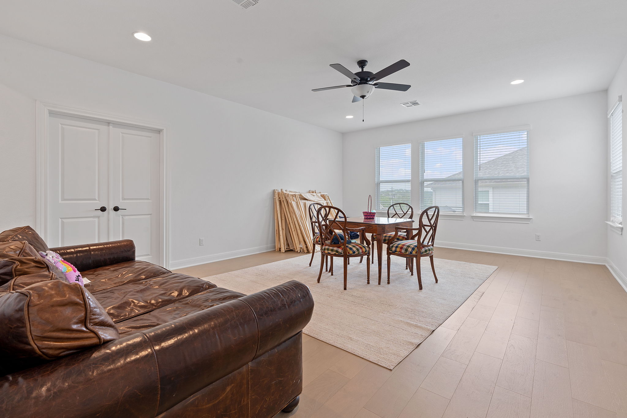 309 Pear Tree Lane Austin, TX 78737 - Photo 29 of 39 a living room with furniture and a large window