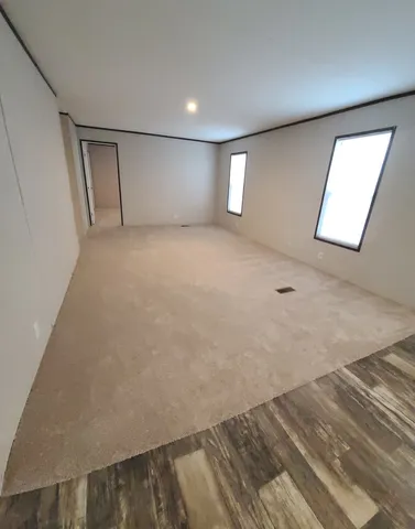 an empty room with windows