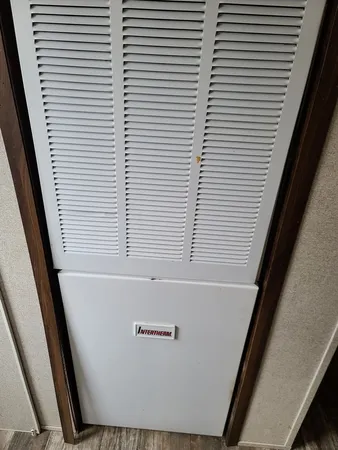 a view of a hallway and a window