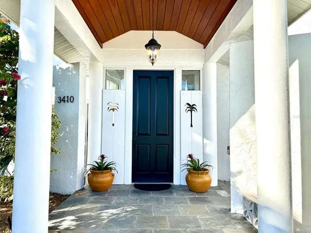 a view of a living room and filled with furniture