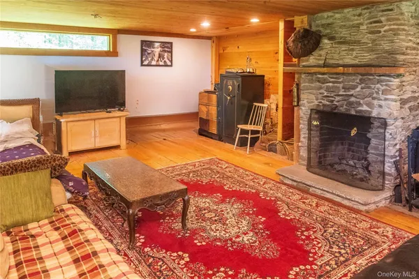 a view of a room with table and chairs