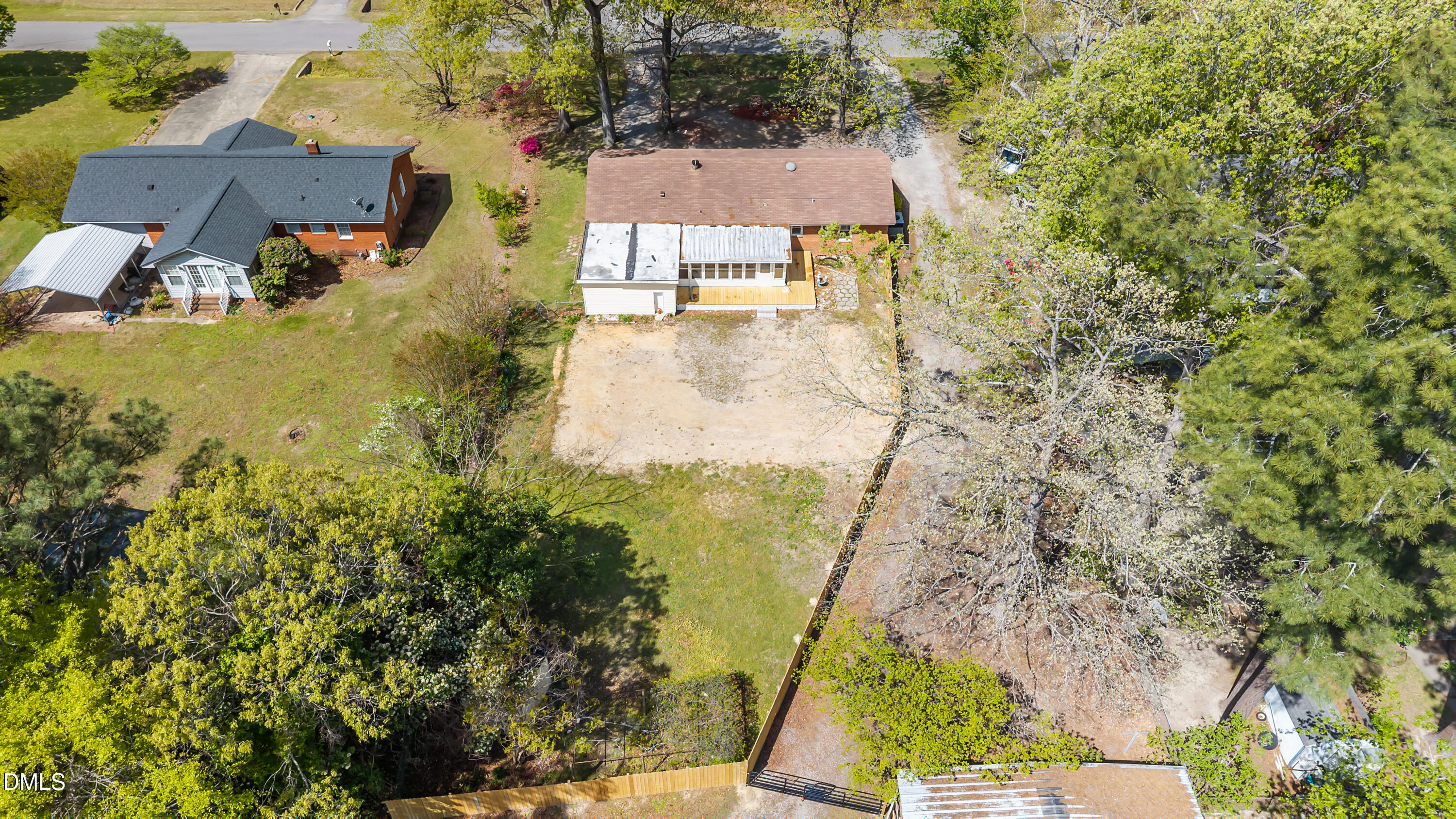 4149 Woodcrest Road Rocky Mount, NC 27803 - Photo 16 of 43 a view of a yard with plants