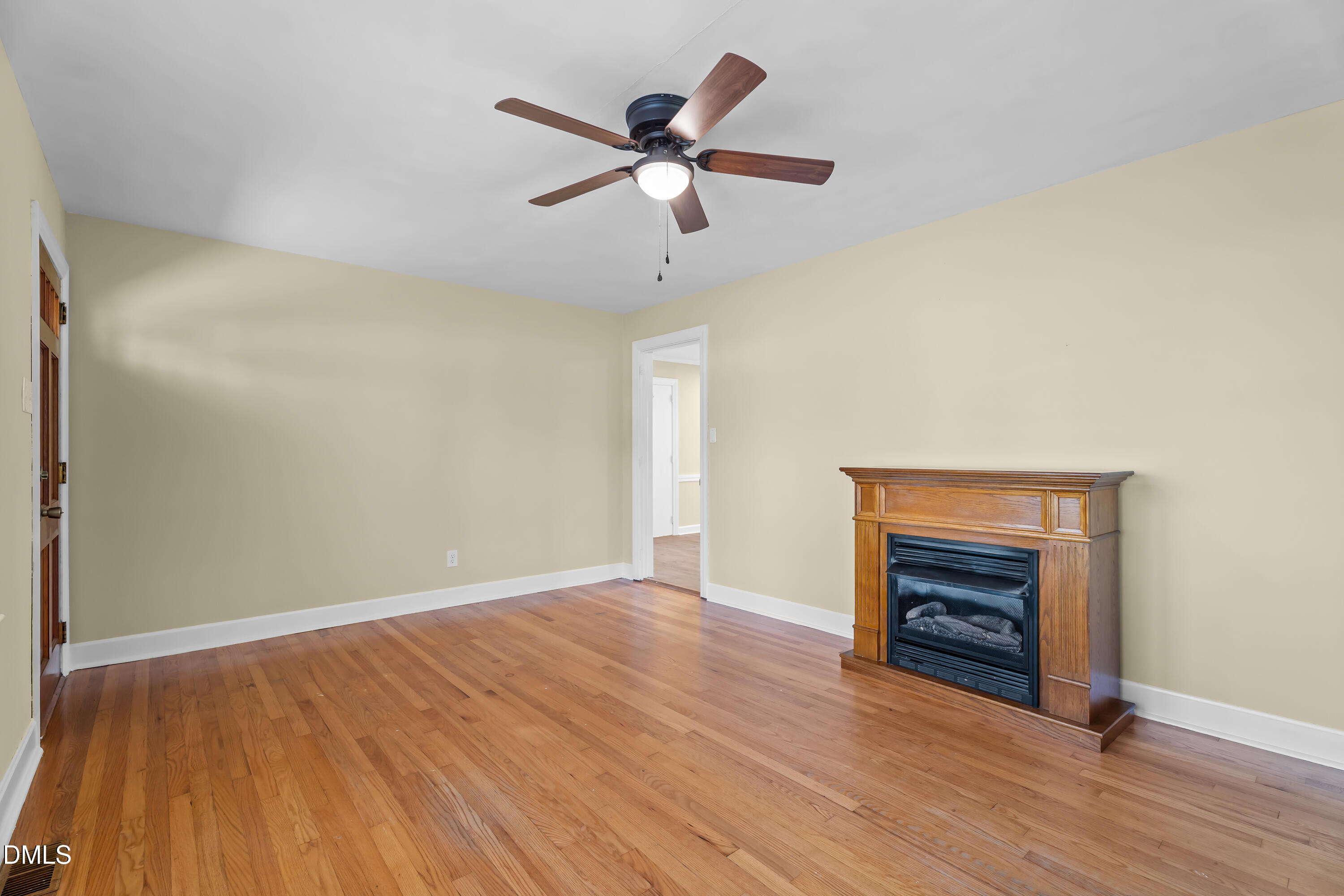 4149 Woodcrest Road Rocky Mount, NC 27803 - Photo 20 of 43 wooden floor in an empty room with a window