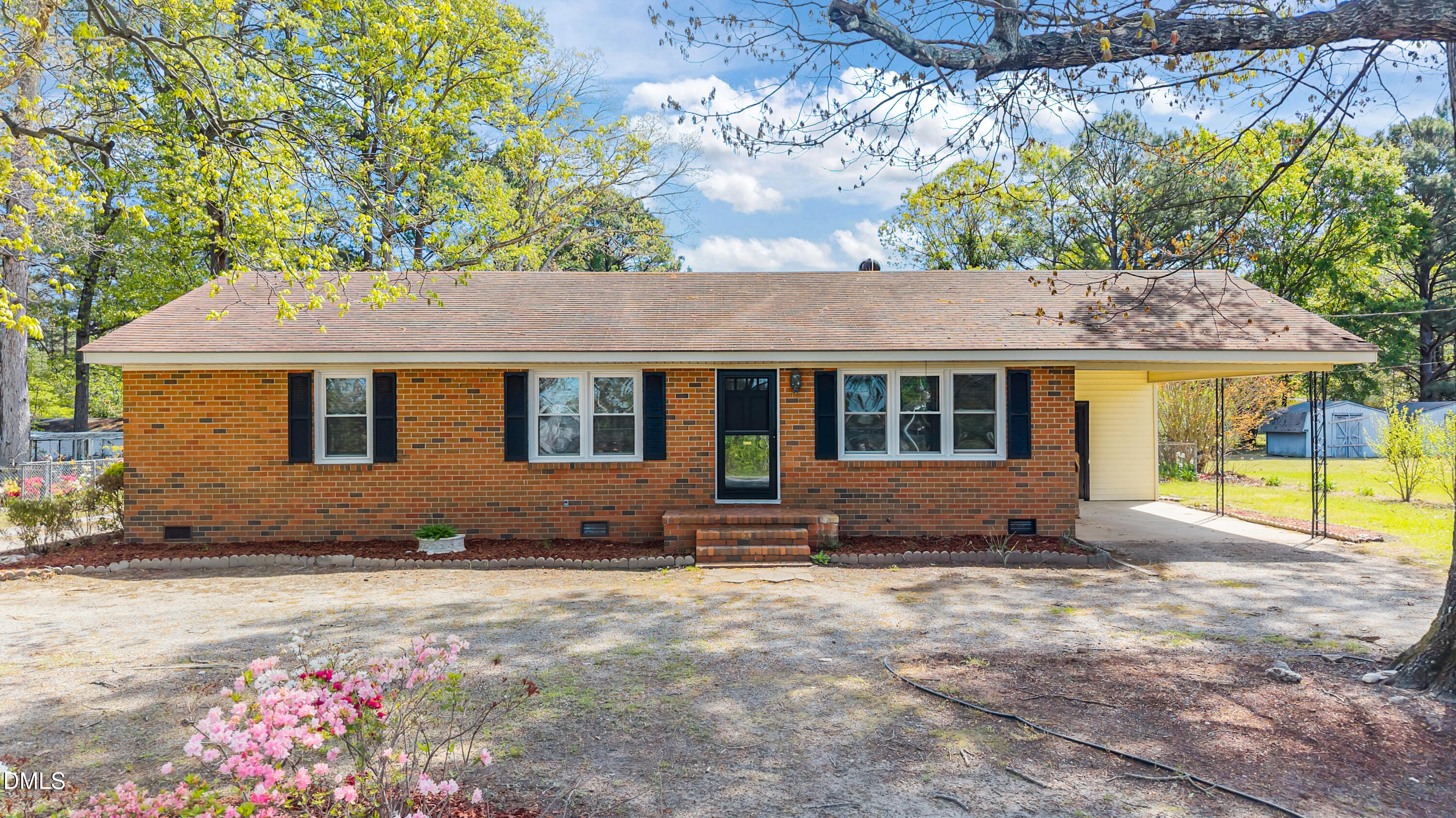 4149 Woodcrest Road Rocky Mount, NC 27803 - Photo 2 of 43 a front view of a house with a yard