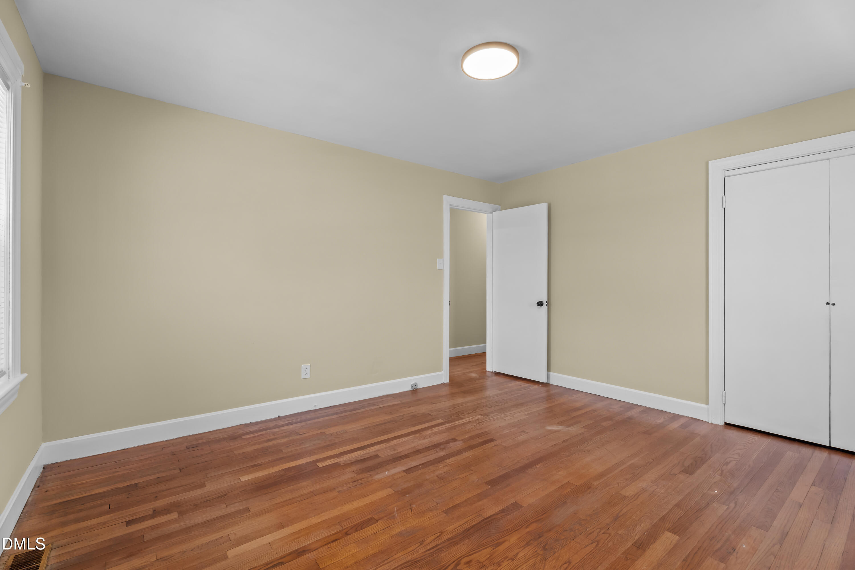 4149 Woodcrest Road Rocky Mount, NC 27803 - Photo 27 of 43 a view of an empty room with wooden floor