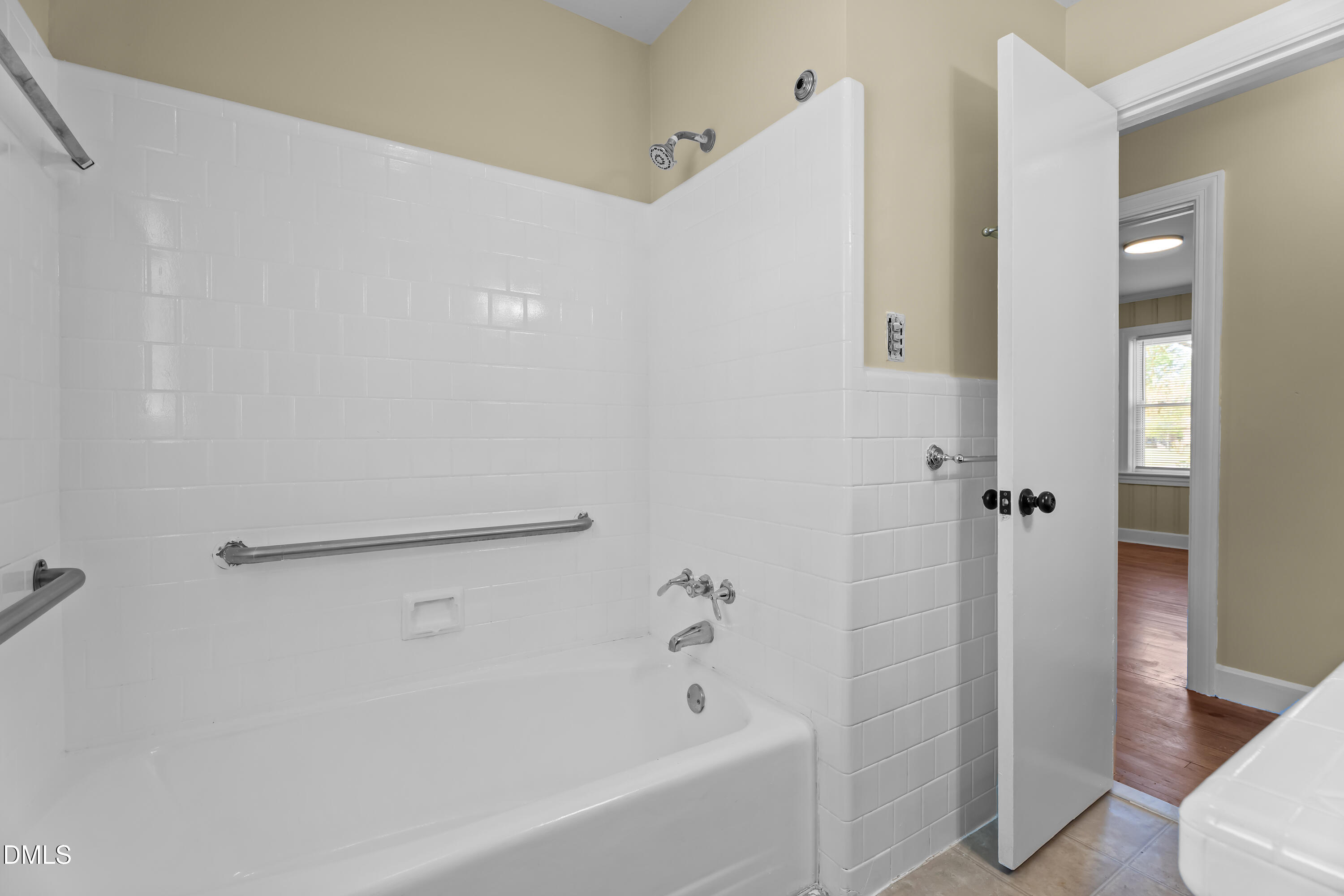 4149 Woodcrest Road Rocky Mount, NC 27803 - Photo 31 of 43 a bathroom with a bathtub