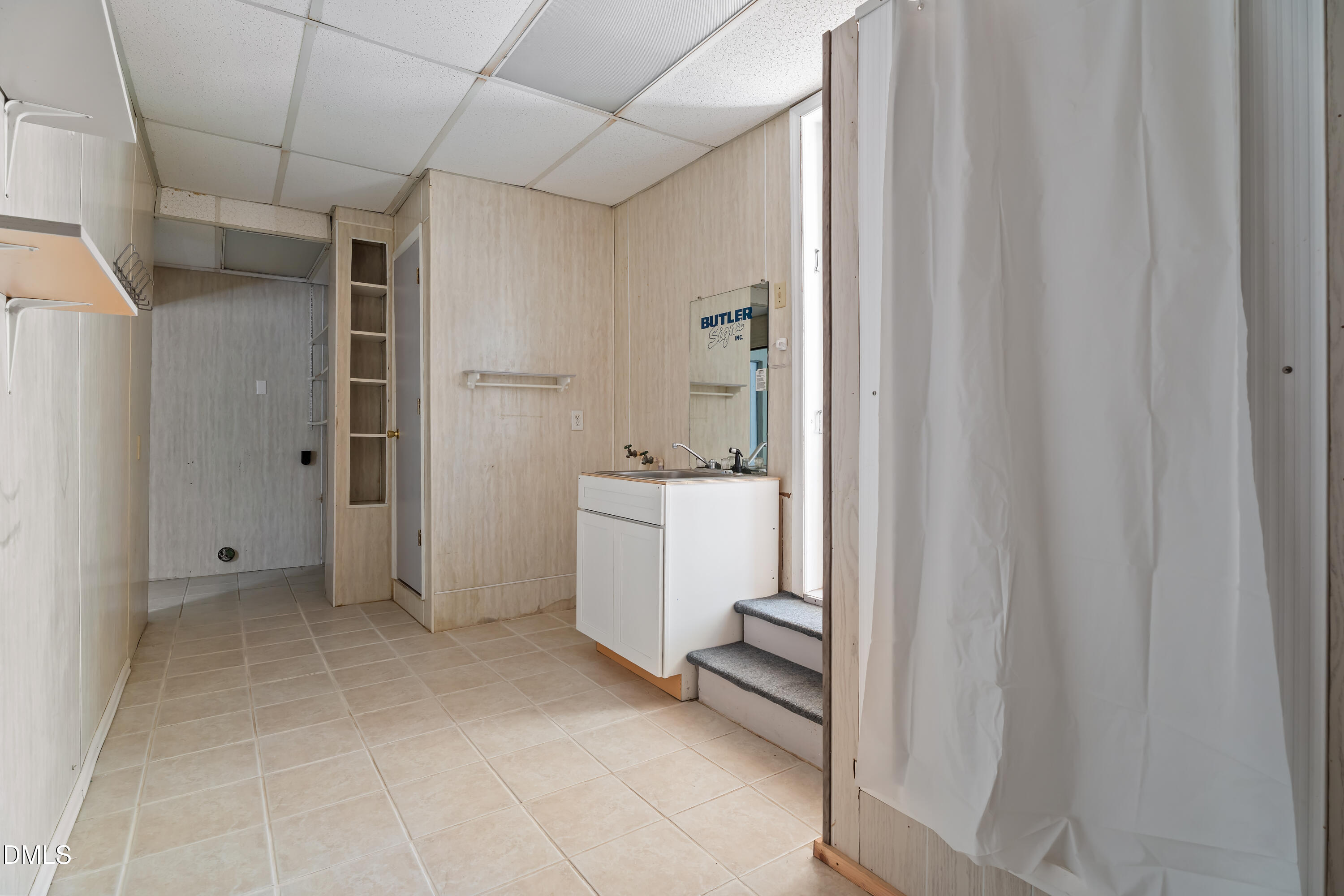 4149 Woodcrest Road Rocky Mount, NC 27803 - Photo 38 of 43 a bathroom with a sink a toilet and shower
