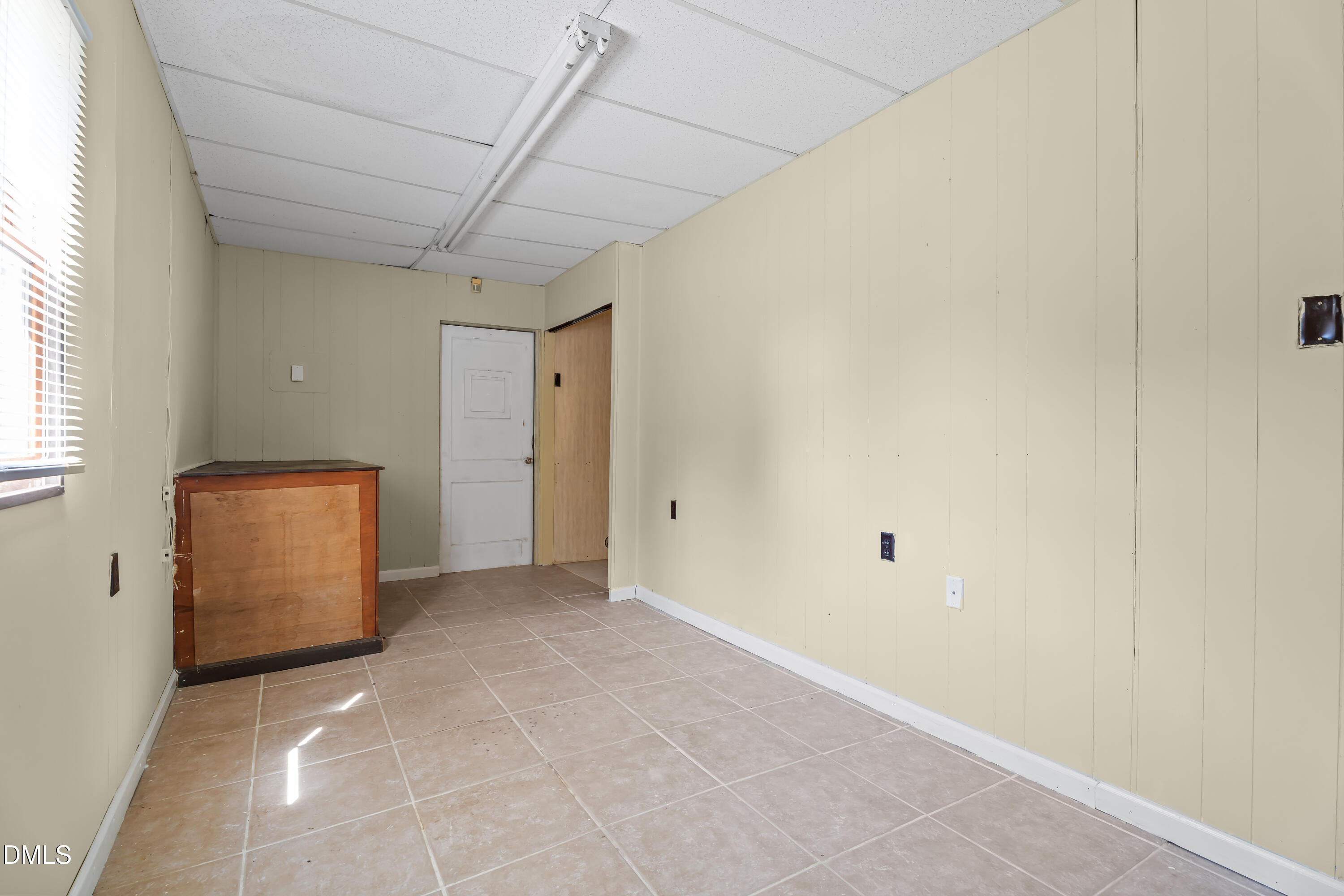 4149 Woodcrest Road Rocky Mount, NC 27803 - Photo 39 of 43 a view of an empty room with a window