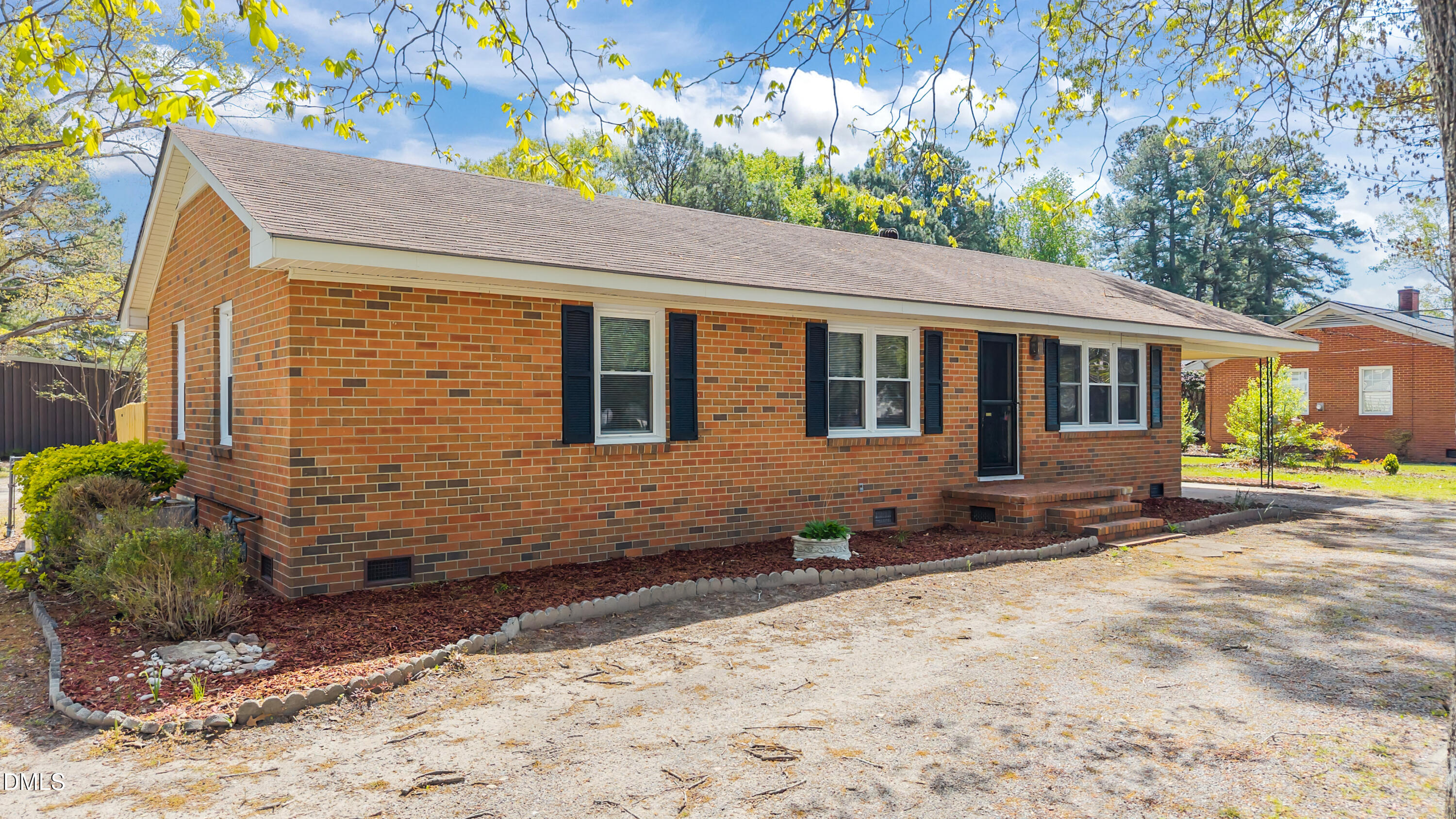 4149 Woodcrest Road Rocky Mount, NC 27803 - Photo 8 of 43 a front view of a house with a yard