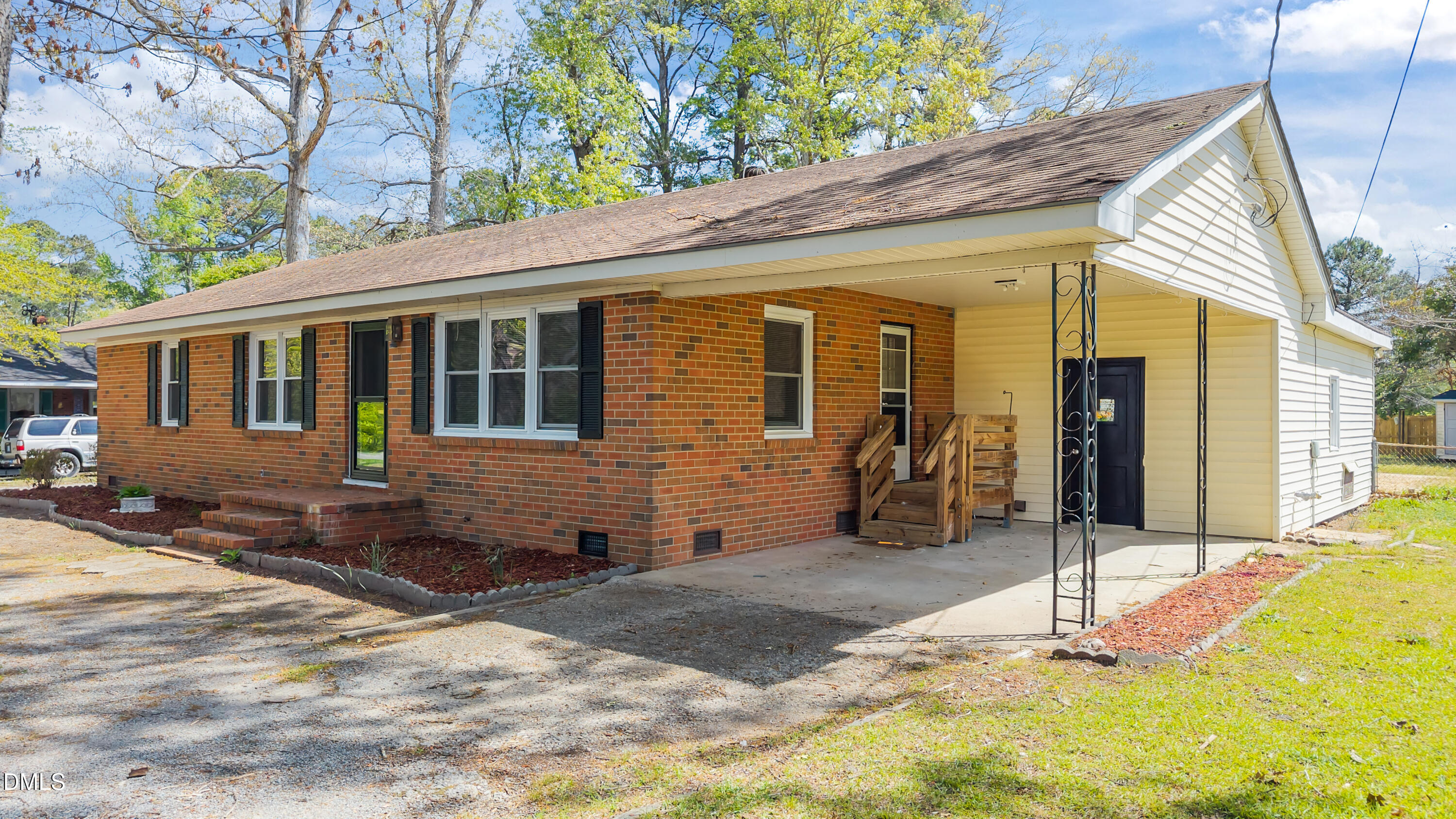 4149 Woodcrest Road Rocky Mount, NC 27803 - Photo 9 of 43 a view of a house with backyard