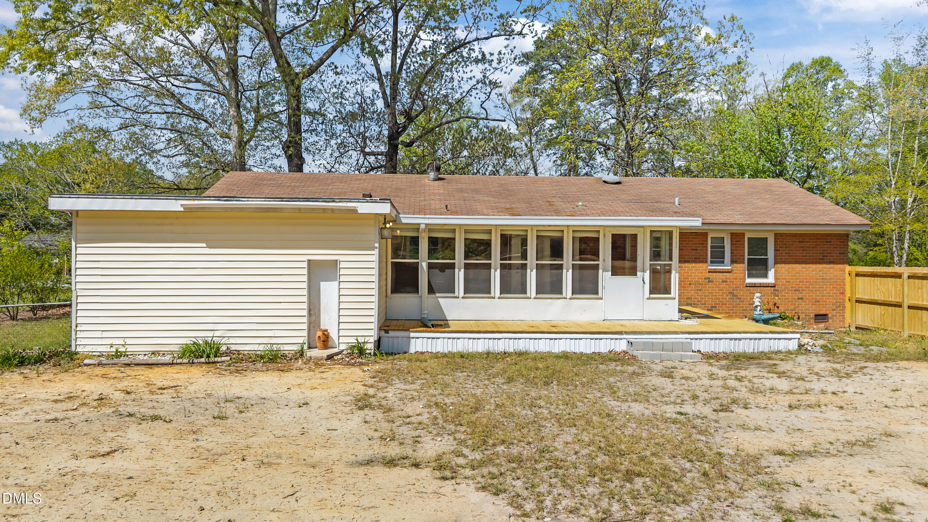 4149 Woodcrest Road Rocky Mount, NC 27803 - Photo 10 of 43 a front view of a house with a garden