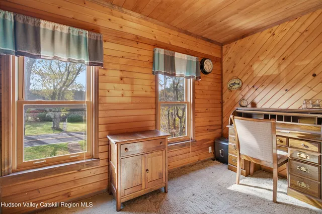 a bedroom with a bed and furniture