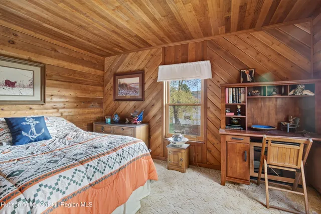 a bathroom with a shower and a toilet