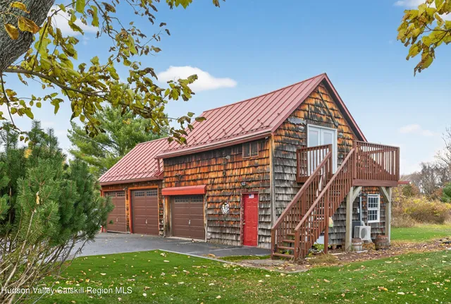 a view of a pathway with a bench