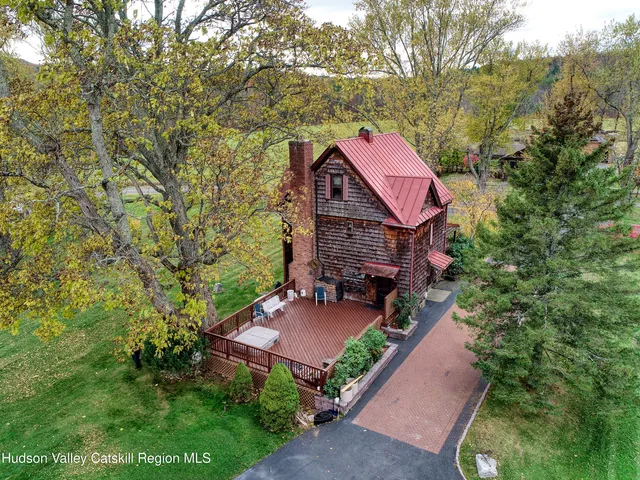 a view of a yard with a patio