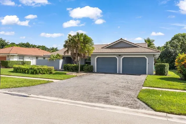 $895,000 | 10082 Harbourtown Court, Boca Raton, FL 33498
