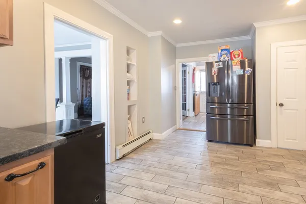 a view of a kitchen with an entryway
