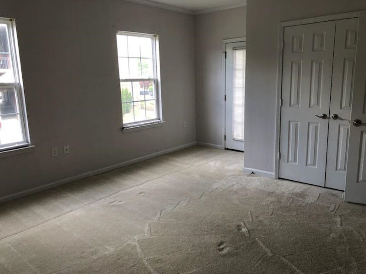 2610 Oldgate Drive, Unit 207 Raleigh, NC 27604 - Photo 2 of 8 spacious main bedroom with access to porch Master Bedroom