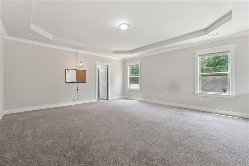 108 Madison Street Canton, GA 30115 - Photo 18 of 43 a view of an empty room with a window