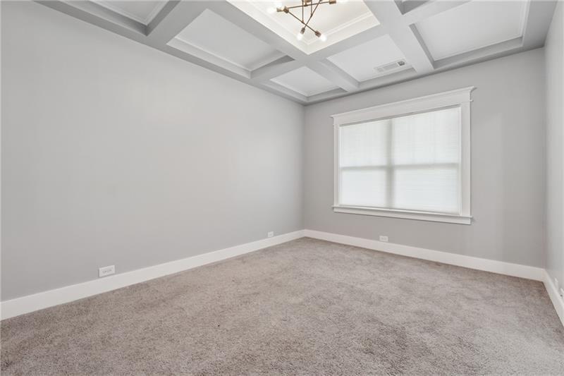 108 Madison Street Canton, GA 30115 - Photo 3 of 43 an empty room with a empty space and windows