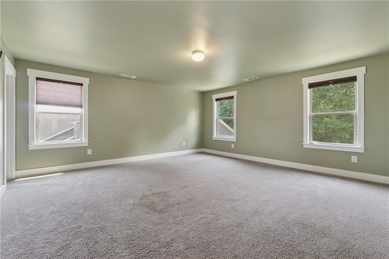 108 Madison Street Canton, GA 30115 - Photo 31 of 43 an empty room with windows and closet
