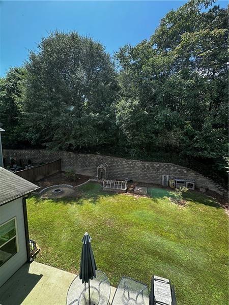 108 Madison Street Canton, GA 30115 - Photo 39 of 43 a view of a swimming pool with a patio