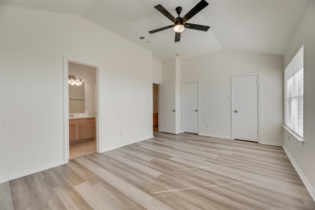 1048 Port Sullivan Drive Little Elm, TX 75068 - Photo 10 of 19 a view of empty room with wooden floor and window