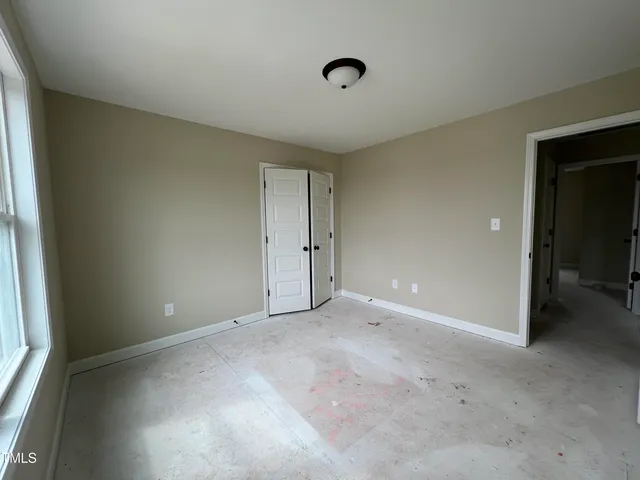 an empty room with an entryway