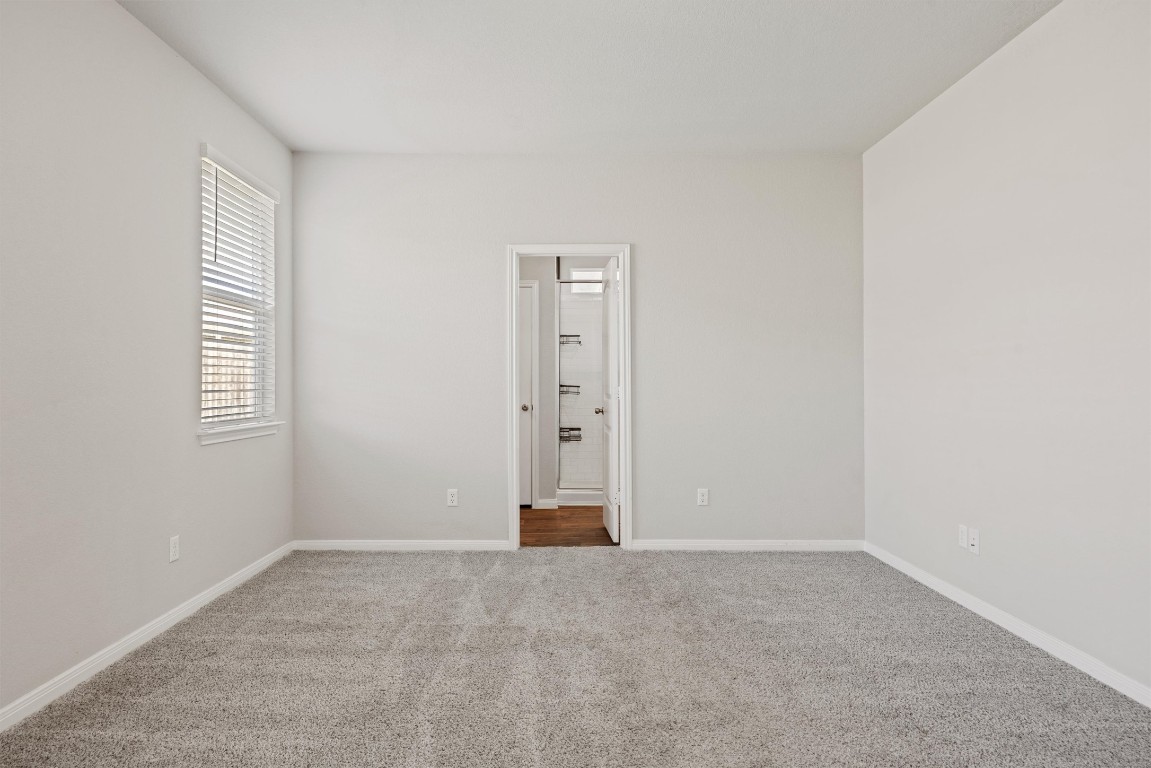 110 Lullaby Drive Georgetown, TX 78626 - Photo 15 of 39 a view of an empty room with a window