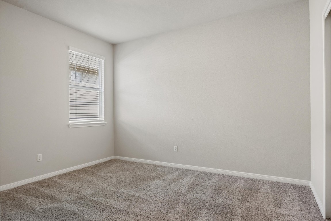 110 Lullaby Drive Georgetown, TX 78626 - Photo 22 of 39 a view of an empty room with a window