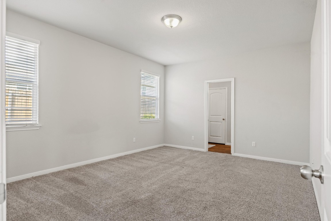 110 Lullaby Drive Georgetown, TX 78626 - Photo 26 of 39 an empty room with windows