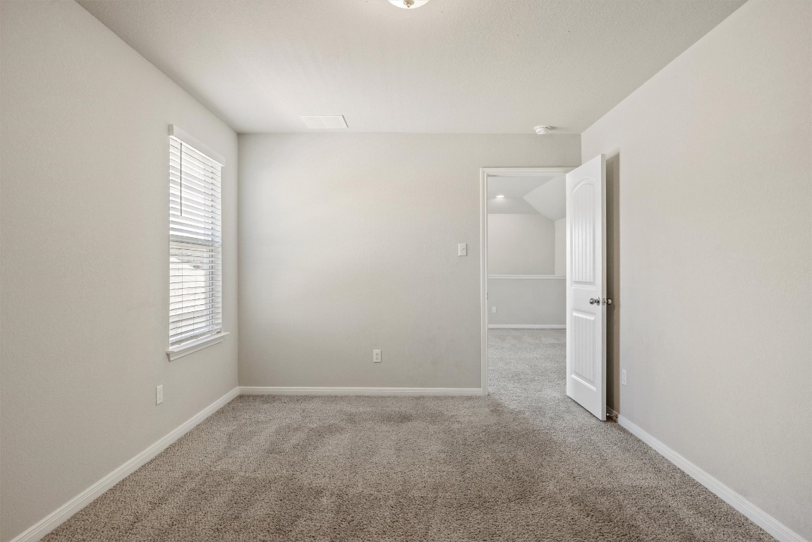 110 Lullaby Drive Georgetown, TX 78626 - Photo 33 of 39 a view of an empty room with windows