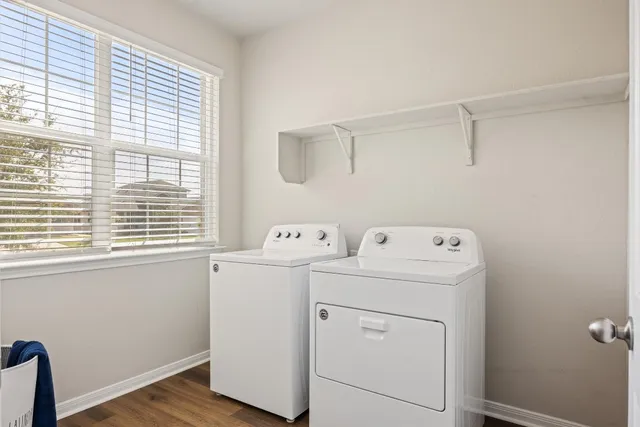 a view of bathroom with a washer and dryer
