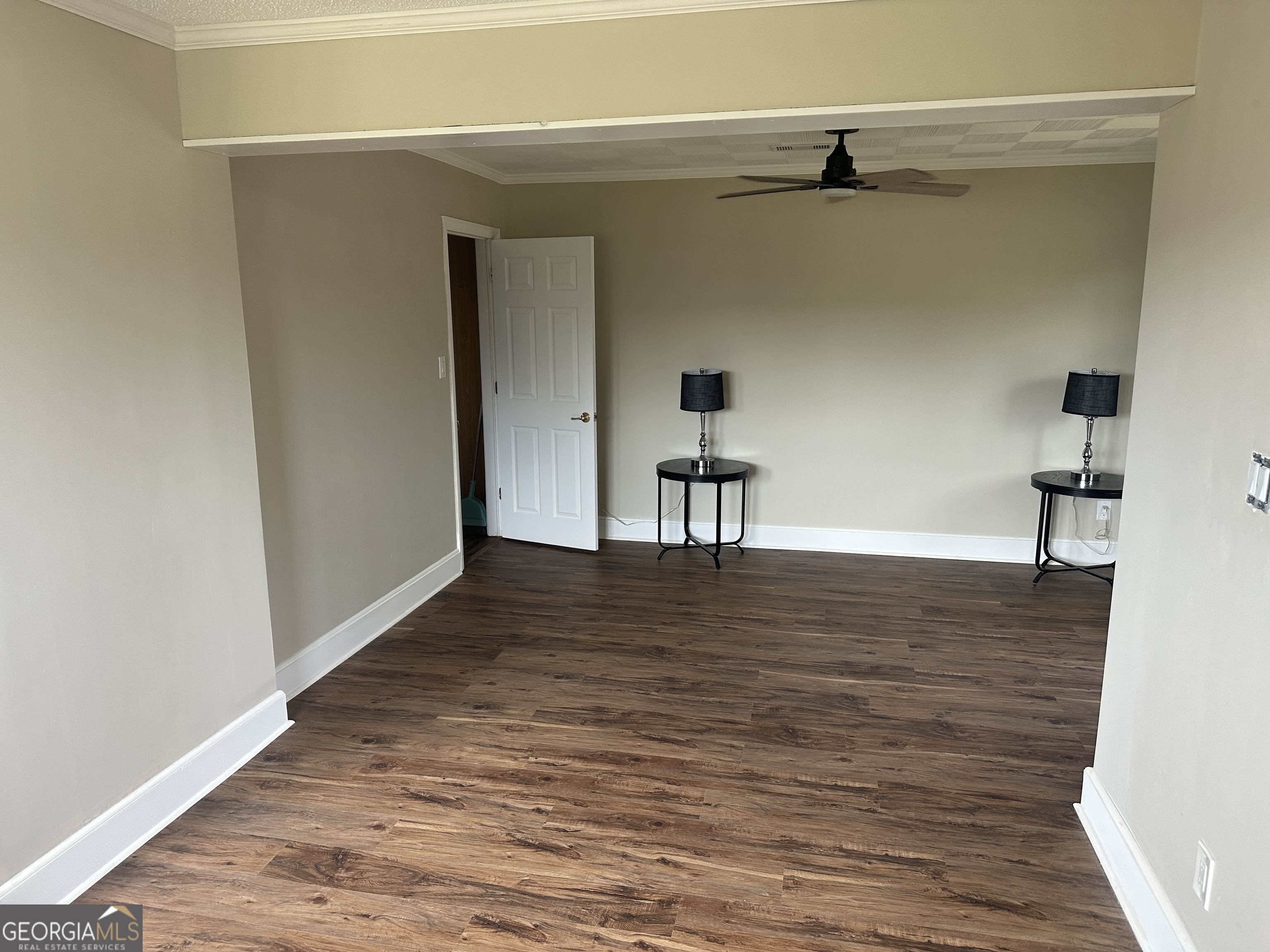509 Whitehill Road Sylvania, GA 30467 - Photo 5 of 14 a view of empty room with wooden floor