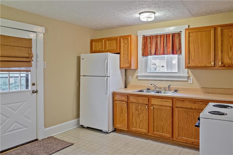 1404 Darlington Road Beaver Falls, PA 15010 - Photo 7 of 20 Enjoy cooking in this wonderful large kitchen with a back door for easy access to the backyard!