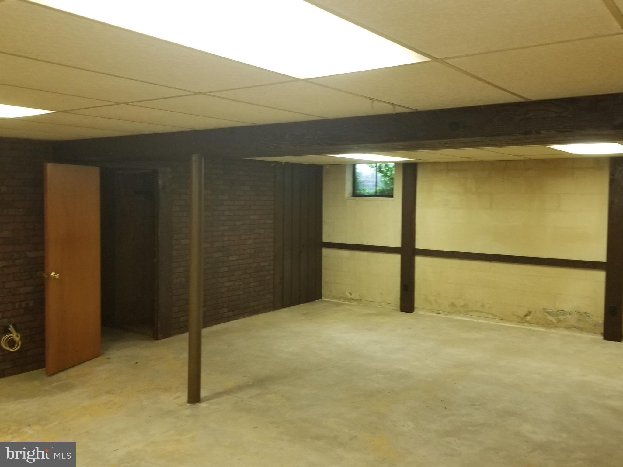478 Lawrence Road Huntingdon Valley, PA 19006 - Photo 16 of 24 Basement Rec room needs flooring